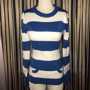Blue and white striped sweater.